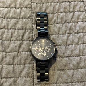 MVMT watch, black and rose gold